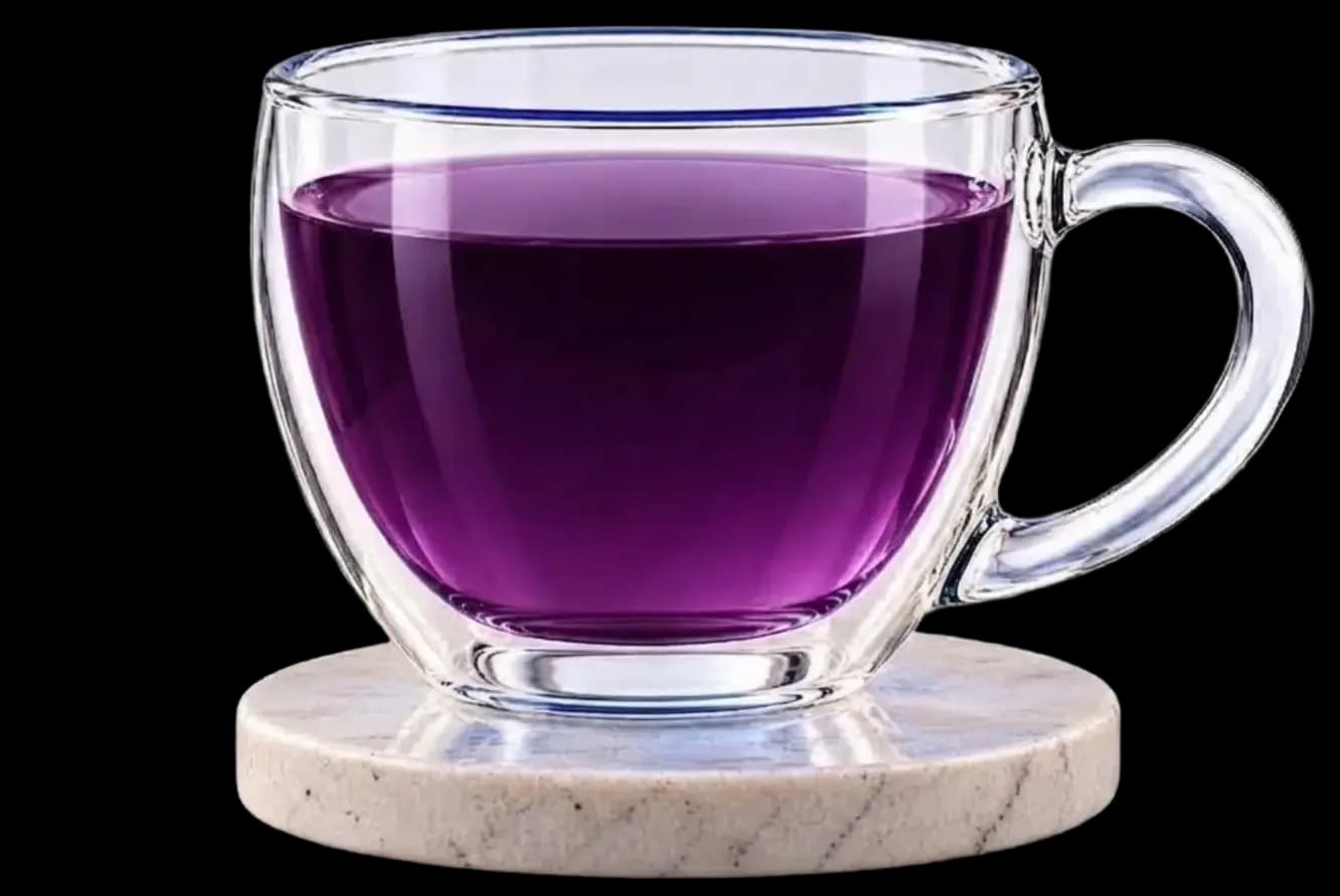 Blue Aurea tea with lemon added, transformed to purple
